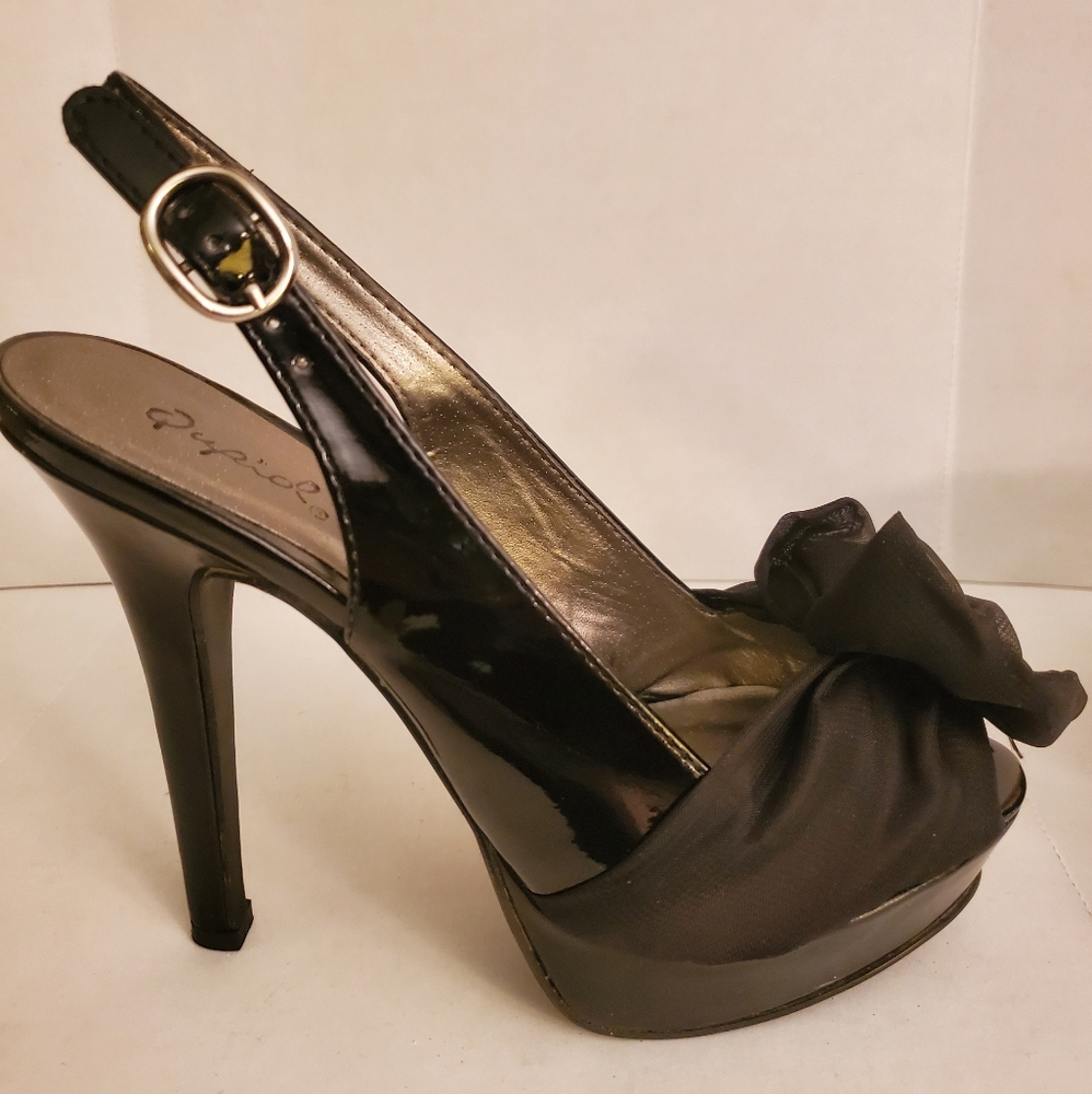Black sling back pumps